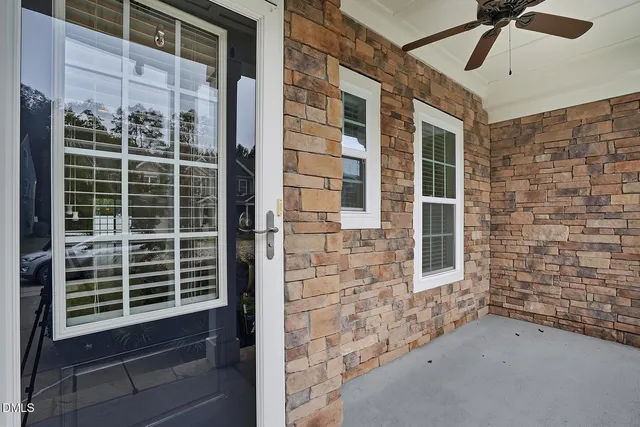 a view of front door of house and windows