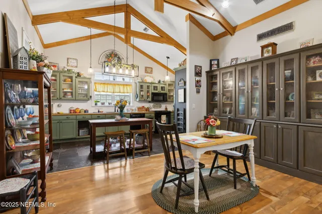 a view of a tables and chairs in patio