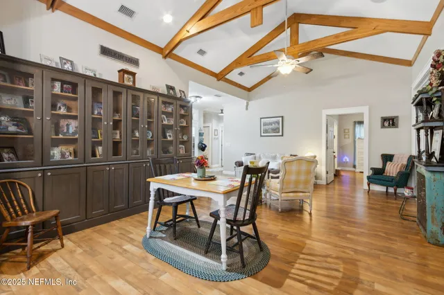 a view of a dining room with furniture