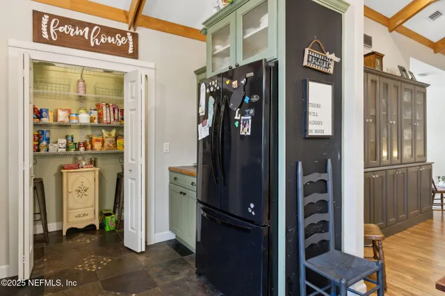 a kitchen with stainless steel appliances granite countertop a stove and a sink