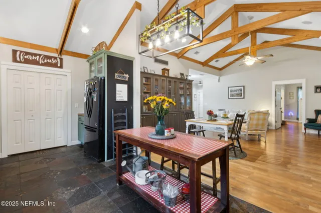a utility room with sink dryer and washer