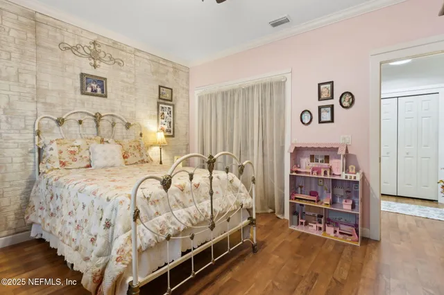 a view of a chairs and table on the wooden deck