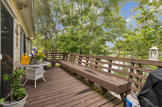 a backyard of a house with outdoor seating