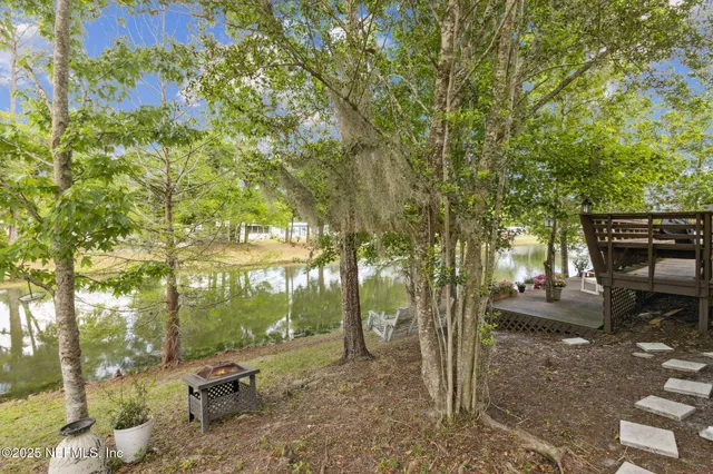 a spacious bedroom with a bed and a table