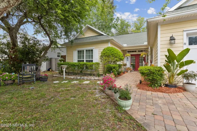 a view of a deck with wooden floor and fence