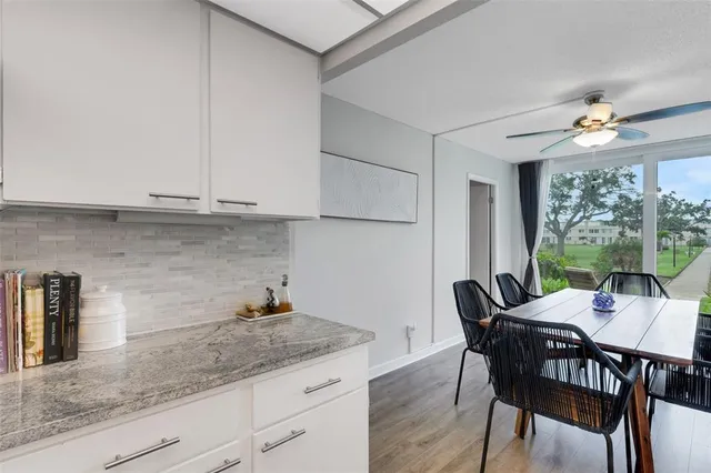 a view of a garden with a apartment