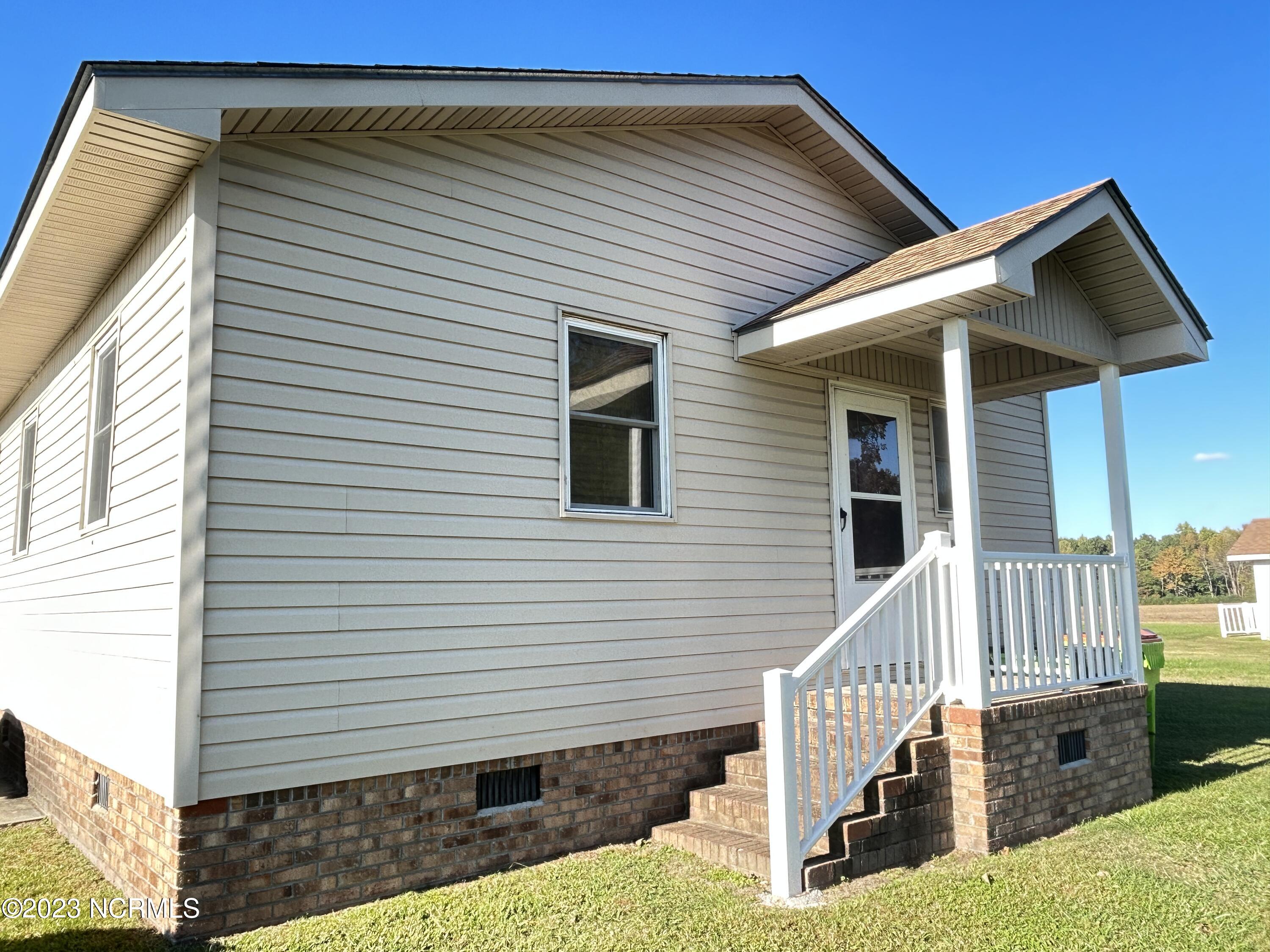 6409 Mary Chapel Road Scotland Neck, NC 27874 - Photo 19 of 51 side view of the home