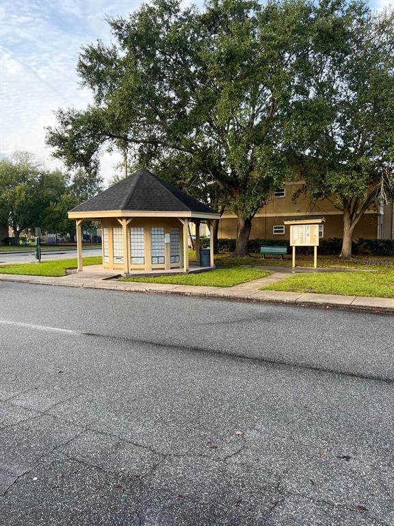9817 Turf Way, Unit GE Orlando, FL 32837 - Photo 2 of 19 a view of an house with swimming pool and yard