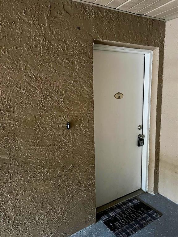 9817 Turf Way, Unit GE Orlando, FL 32837 - Photo 3 of 19 a bathroom with a shower