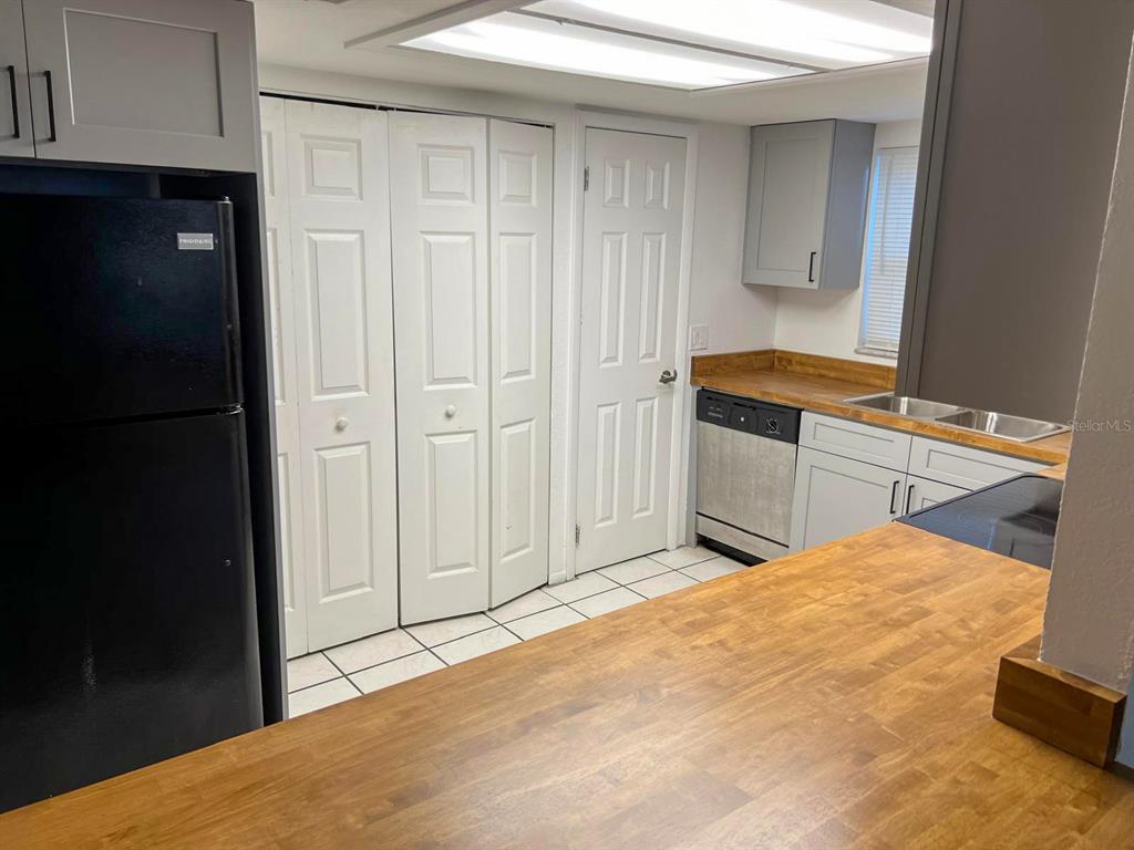 9817 Turf Way, Unit GE Orlando, FL 32837 - Photo 10 of 19 a view of a kitchen with a sink