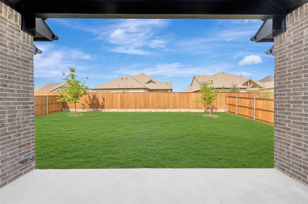 11460 Wulstone Road Fort Worth, TX 76052 - Photo 34 of 40 a view of a garden with a lake
