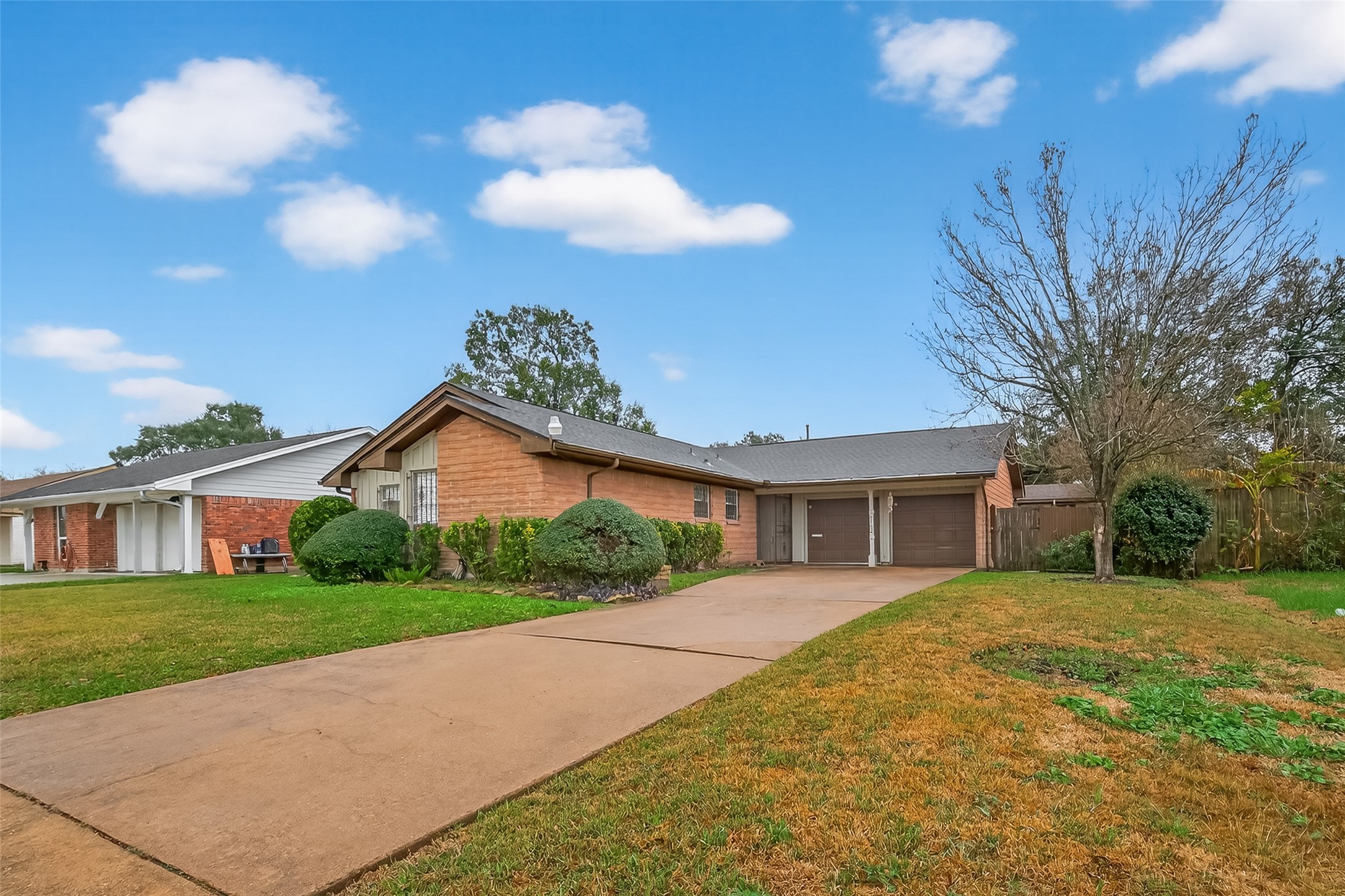 7702 Rockhill Street Houston, TX 77061 - Photo 5 of 30 a view of a house with a yard