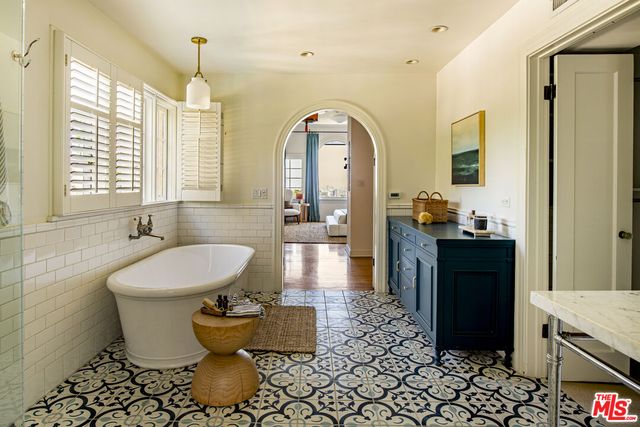 a bathroom with a shower and a toilet