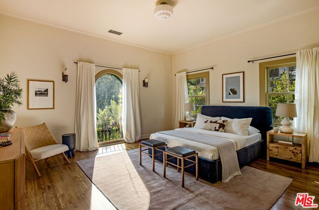 a kitchen with stainless steel appliances kitchen island granite countertop a sink and cabinets