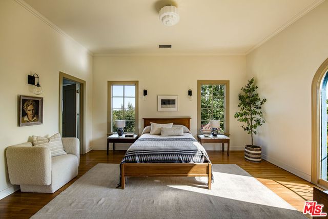 a bathroom with a sink mirror and vanity