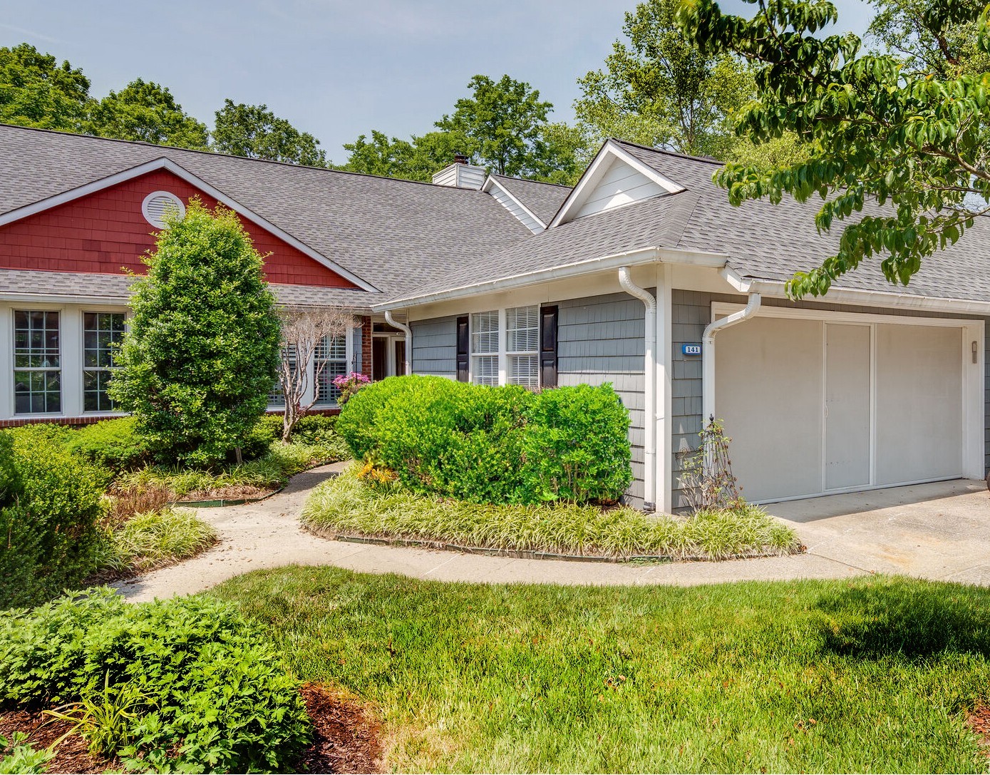 231 Green Harbor Road, Unit 141 Old Hickory, TN 37138 - Photo 1 of 40 a front view of a house with a yard