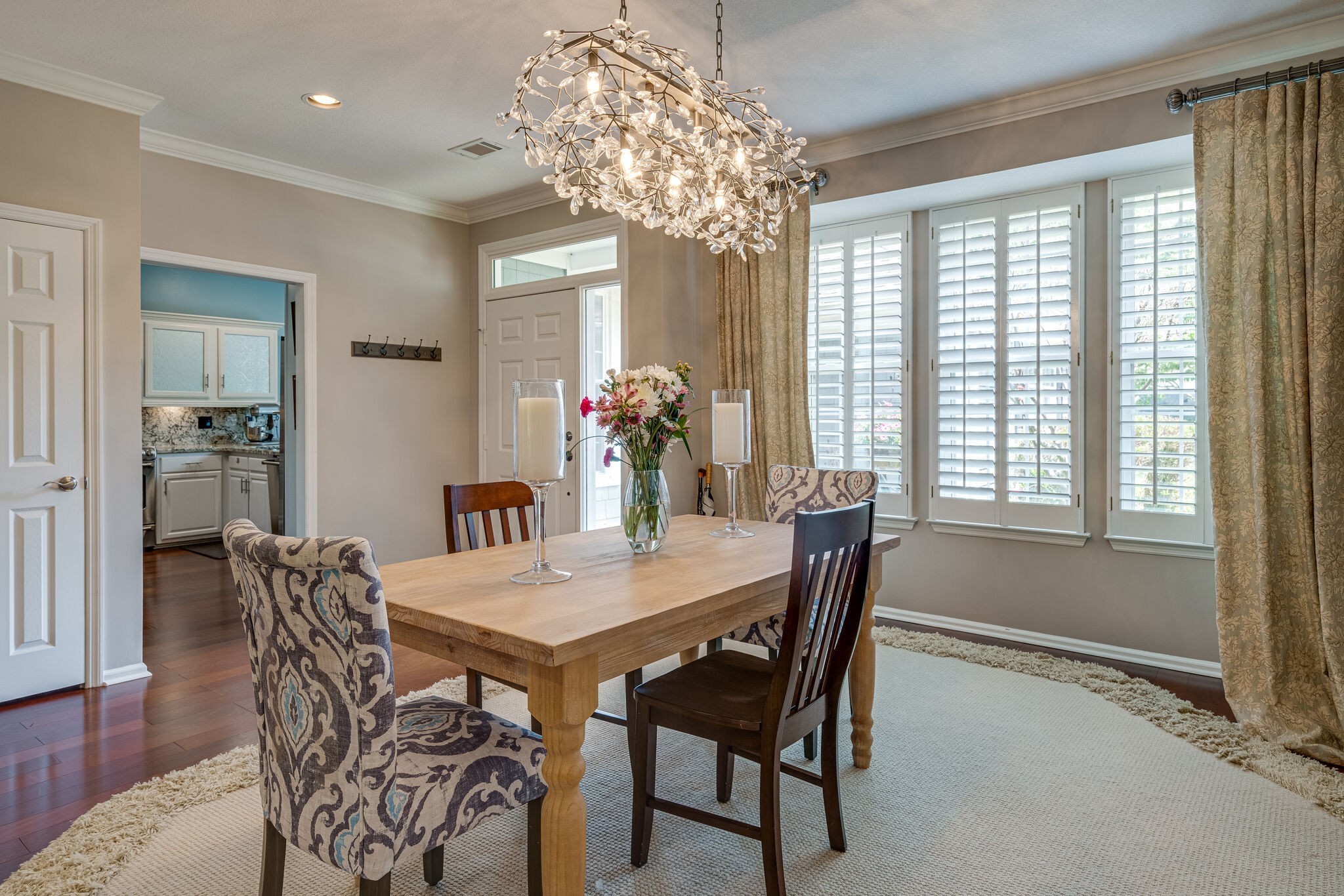 231 Green Harbor Road, Unit 141 Old Hickory, TN 37138 - Photo 13 of 40 a dining room with furniture a chandelier and wooden floor