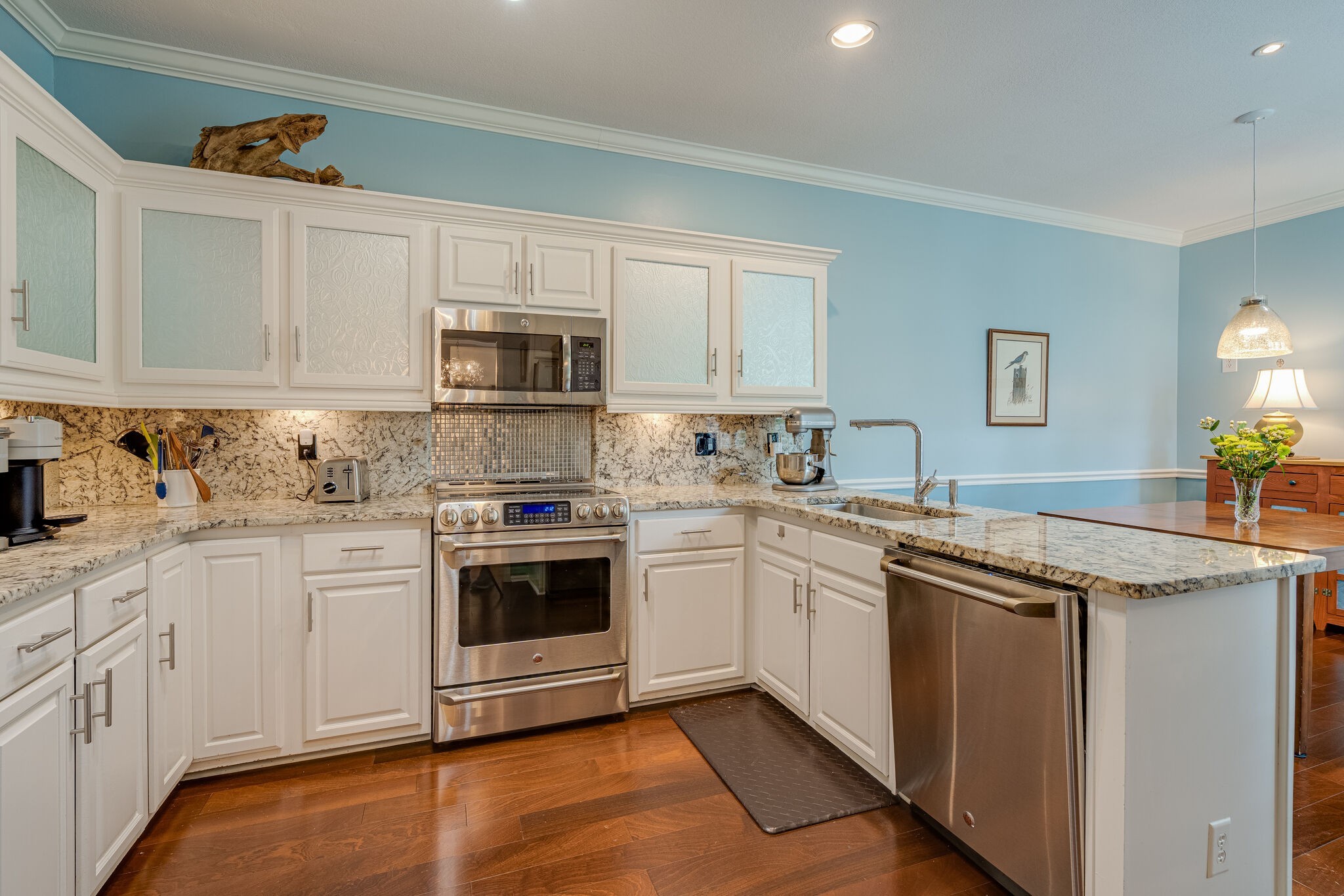 231 Green Harbor Road, Unit 141 Old Hickory, TN 37138 - Photo 17 of 40 a kitchen with stainless steel appliances granite countertop a stove and white cabinets