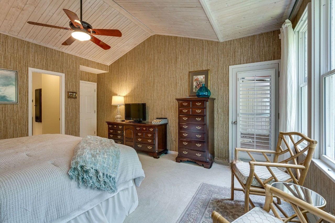 231 Green Harbor Road, Unit 141 Old Hickory, TN 37138 - Photo 20 of 40 a bedroom with furniture and a flat screen tv