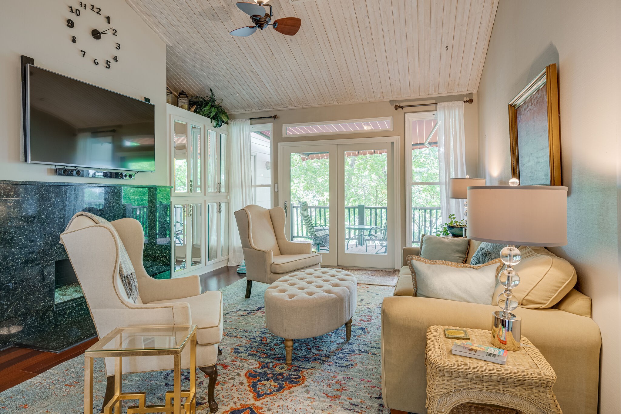231 Green Harbor Road, Unit 141 Old Hickory, TN 37138 - Photo 2 of 40 a living room with furniture a flat screen tv and floor to ceiling window