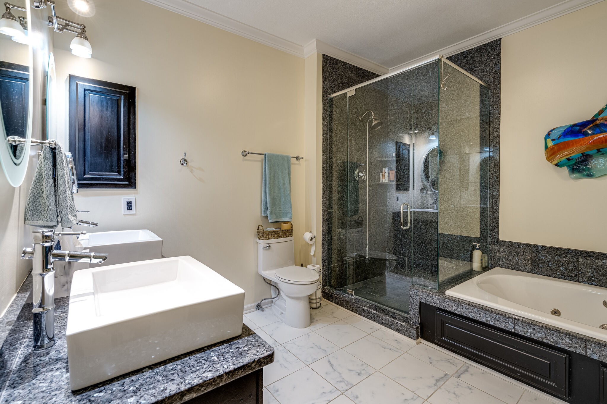 231 Green Harbor Road, Unit 141 Old Hickory, TN 37138 - Photo 21 of 40 a bathroom with a granite countertop sink a toilet a mirror and shower