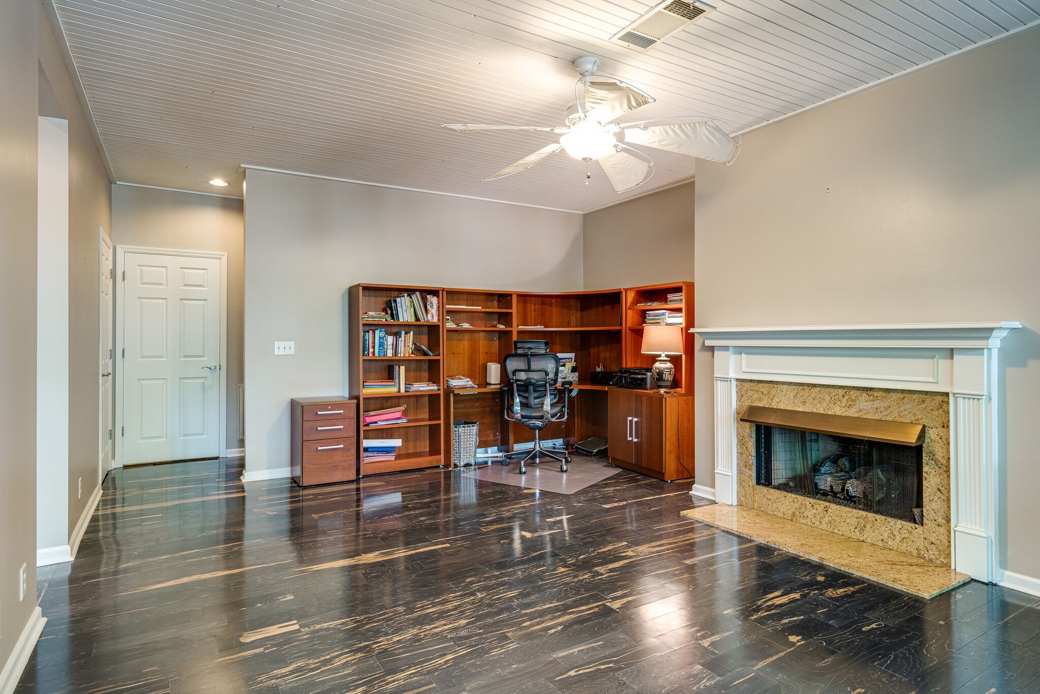 231 Green Harbor Road, Unit 141 Old Hickory, TN 37138 - Photo 26 of 40 a living room with furniture a fireplace and a chandelier