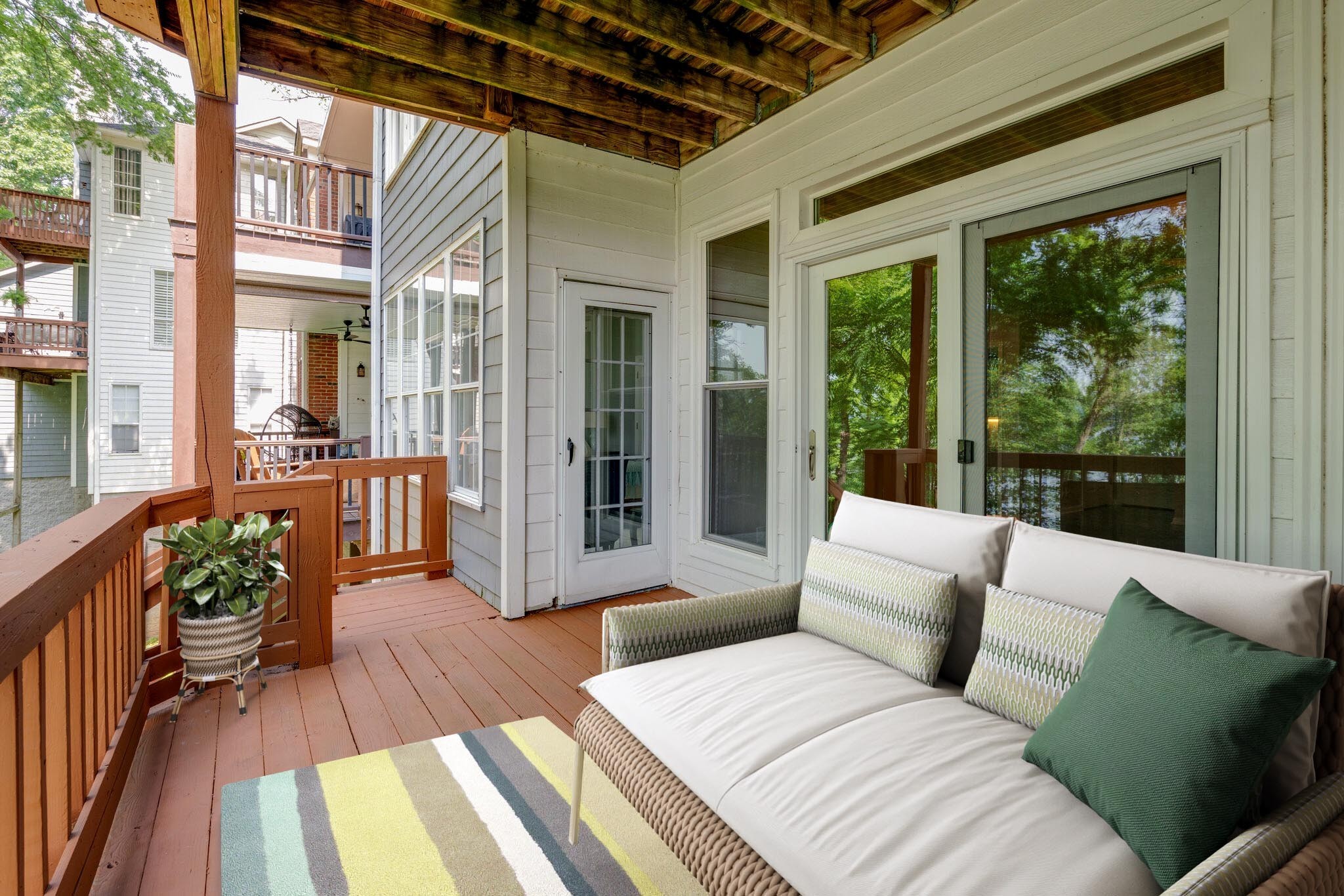 231 Green Harbor Road, Unit 141 Old Hickory, TN 37138 - Photo 27 of 40 a balcony with furniture and wooden floor