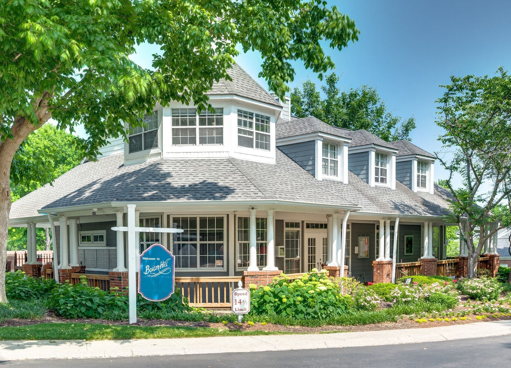 231 Green Harbor Road, Unit 141 Old Hickory, TN 37138 - Photo 34 of 40 a front view of a house with a garden and porch