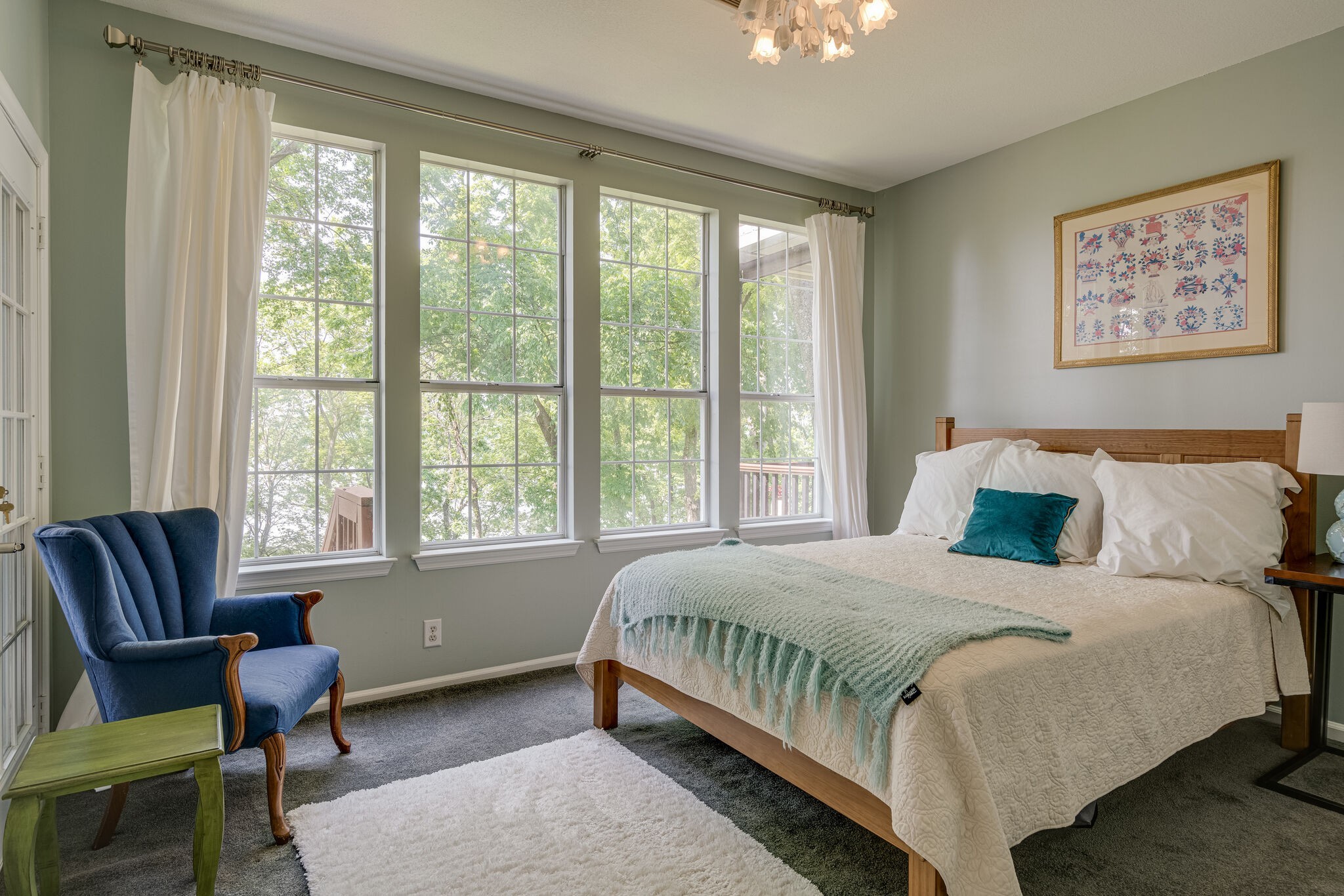 231 Green Harbor Road, Unit 141 Old Hickory, TN 37138 - Photo 5 of 40 a bedroom with a bed and a couch