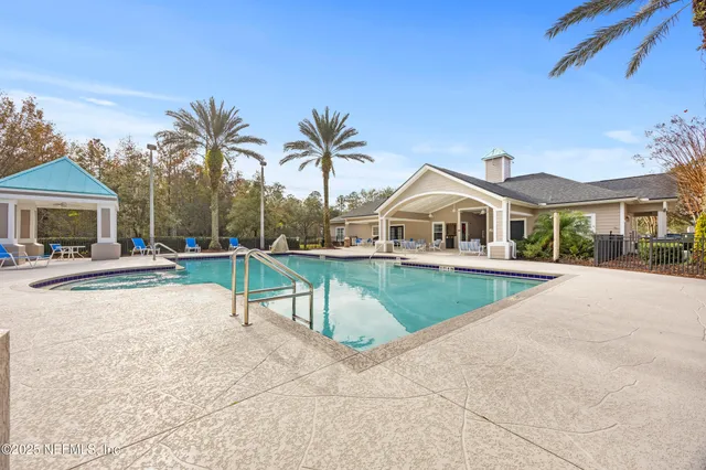 a view of a house with a swimming pool