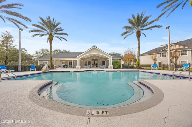 a bathroom with a green field
