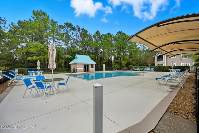 a view of a house with a swimming pool