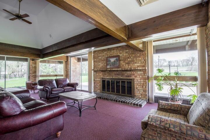 11958 West Mill Road, Unit 24 Milwaukee, WI 53225 - Photo 18 of 21 Club House Fireplace