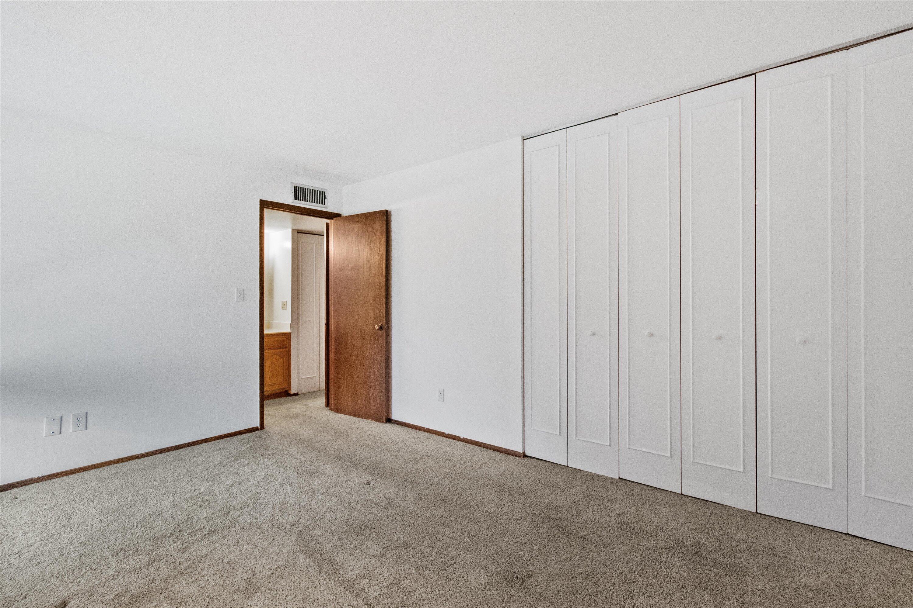 11958 West Mill Road, Unit 24 Milwaukee, WI 53225 - Photo 8 of 21 Bedroom