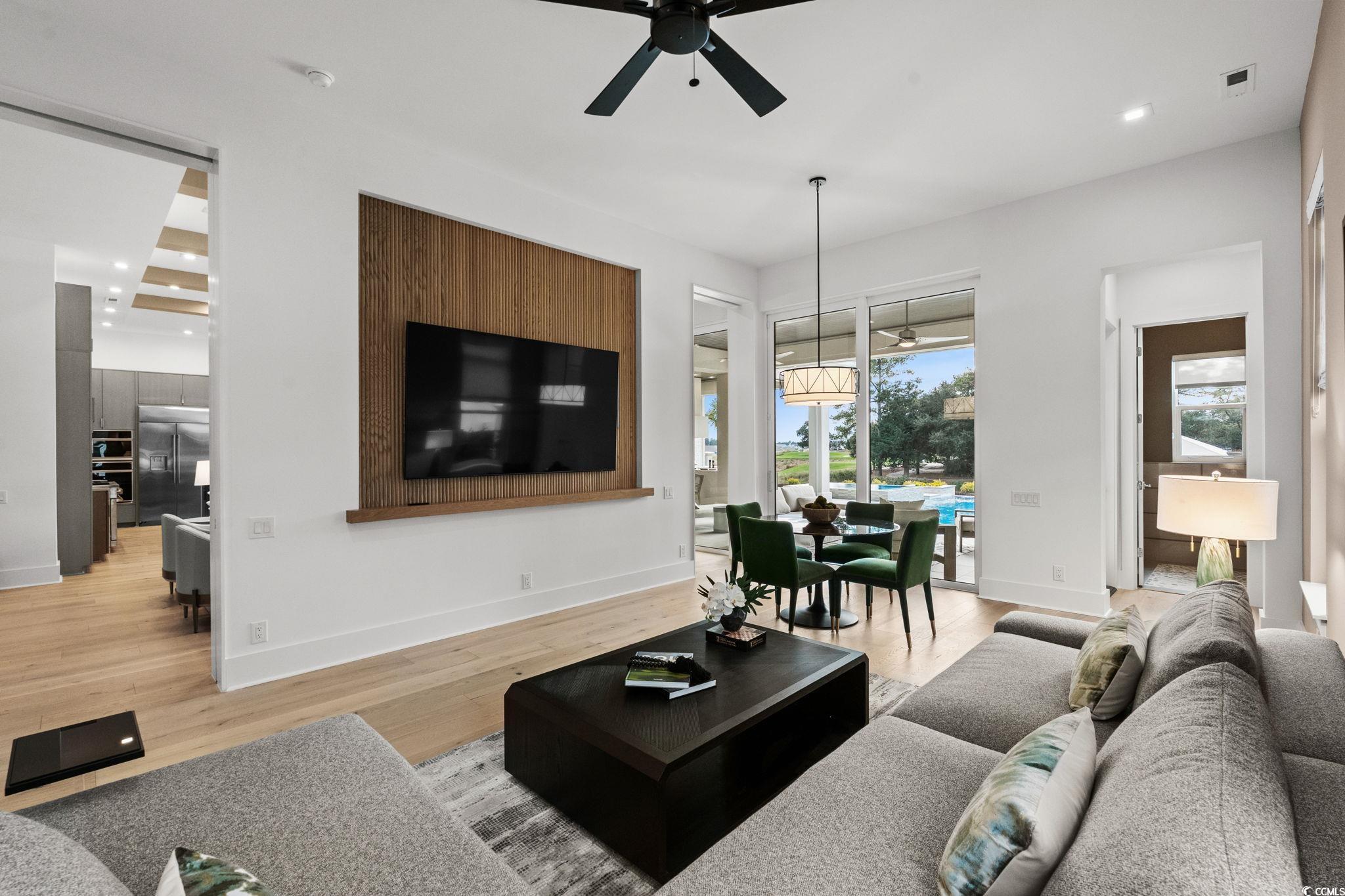 9273 Venezia Circle Myrtle Beach, SC 29579 - Photo 16 of 40 Living area with a ceiling fan, recessed lighting, and light wood-style flooring