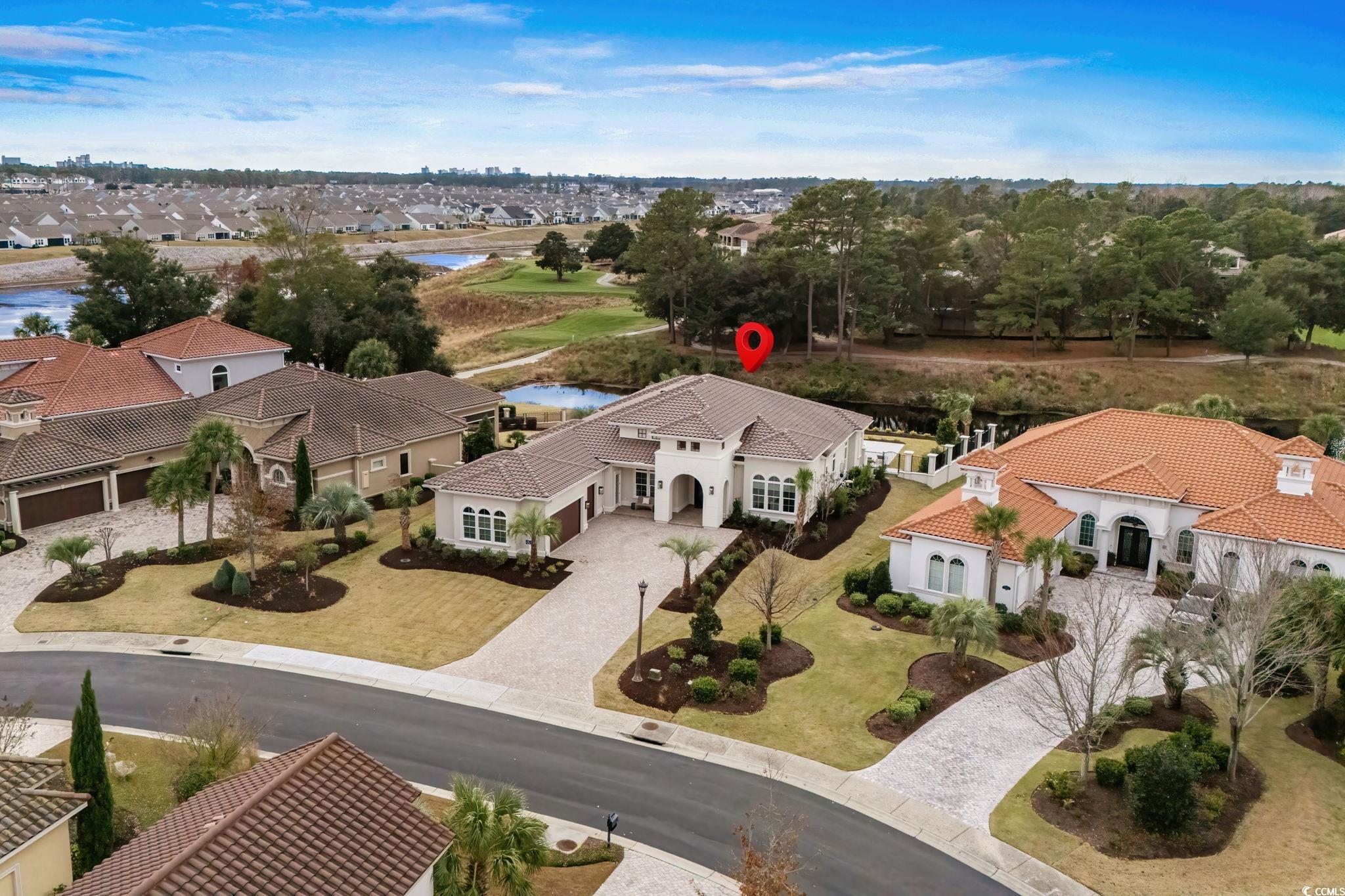 9273 Venezia Circle Myrtle Beach, SC 29579 - Photo 2 of 40 Aerial view of residential area with a nearby body of water