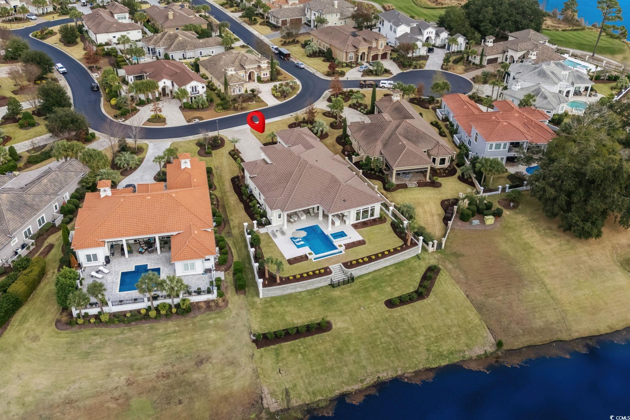 9273 Venezia Circle Myrtle Beach, SC 29579 - Photo 3 of 40 Aerial overview of property's location with a large body of water and nearby suburban area