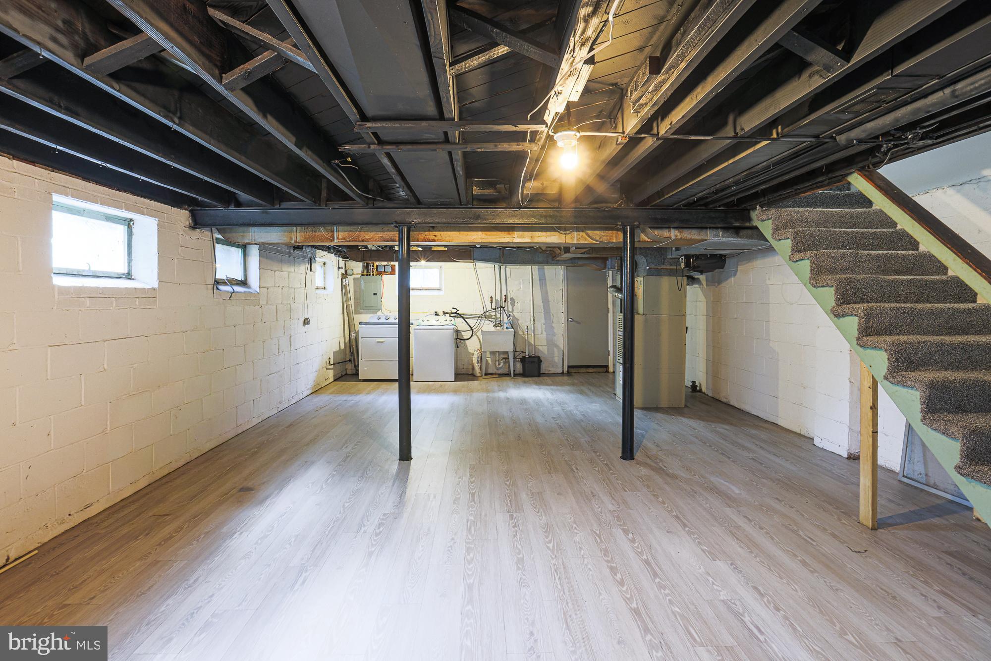 3914 Bancroft Road Baltimore, MD 21215 - Photo 19 of 25 a view of empty room with wooden floor