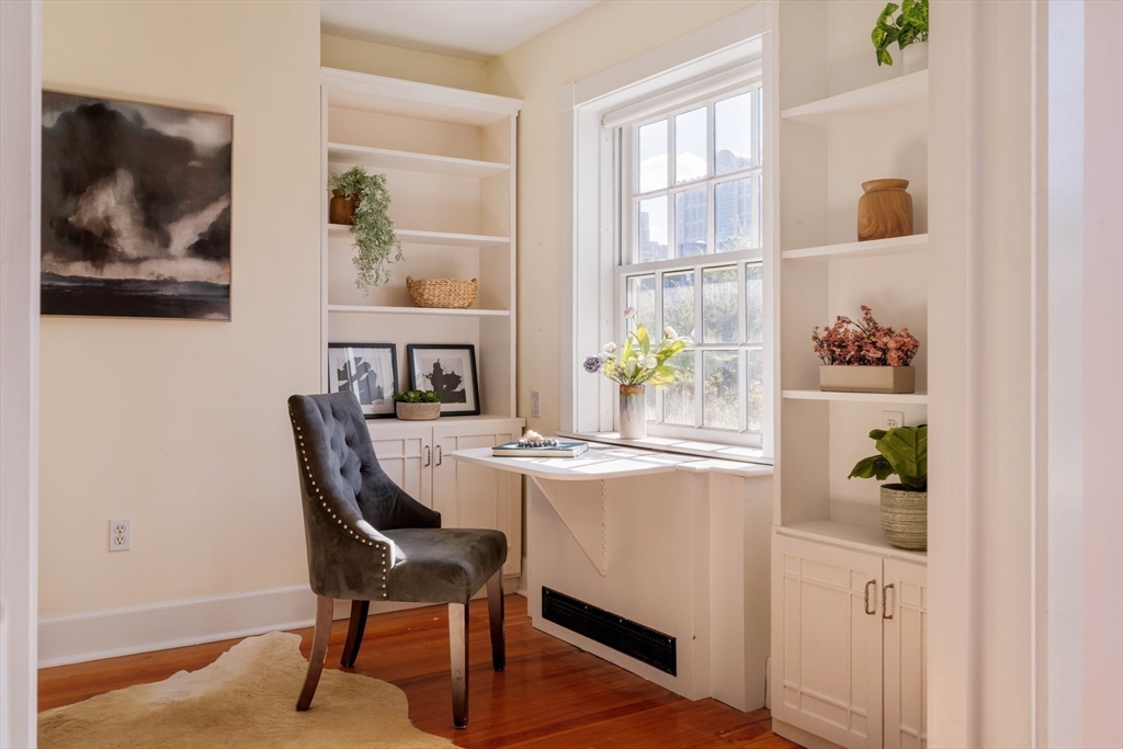 169 Commonwealth Avenue, Unit 5 Boston, MA 02116 - Photo 13 of 31 a dining room with furniture and window