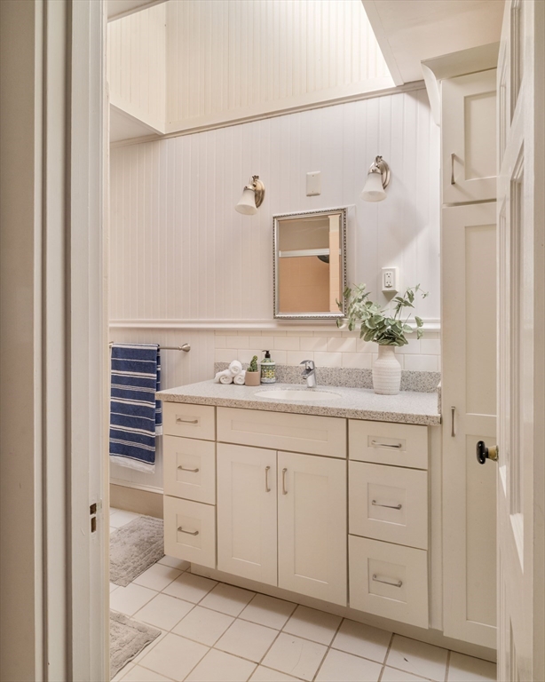 169 Commonwealth Avenue, Unit 5 Boston, MA 02116 - Photo 23 of 31 a bathroom with a sink and a mirror