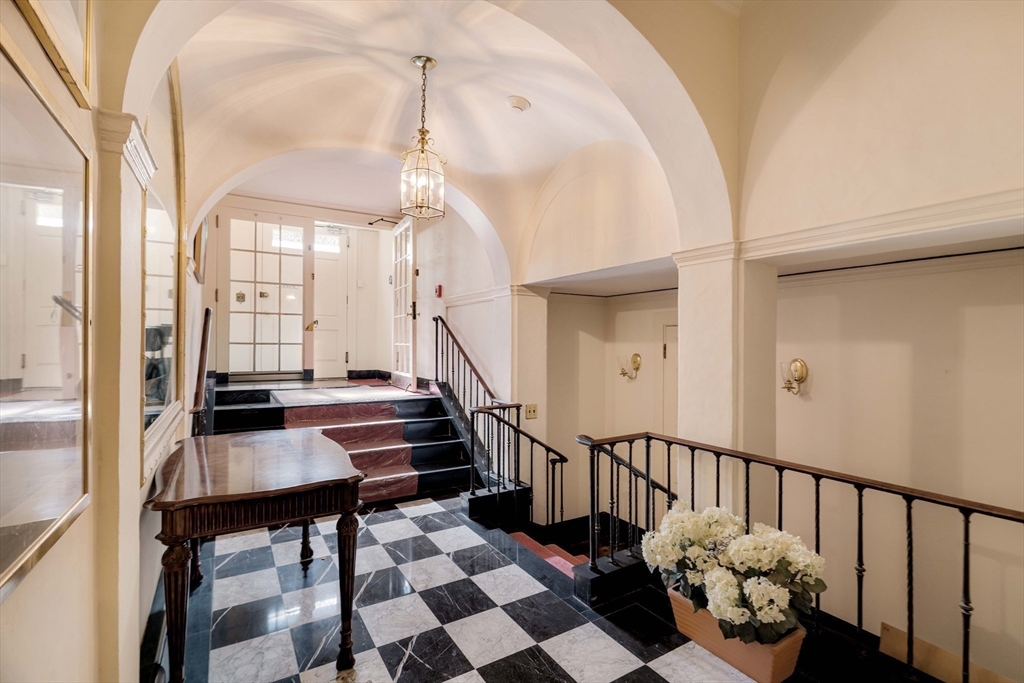 169 Commonwealth Avenue, Unit 5 Boston, MA 02116 - Photo 29 of 31 a view of entryway and hall with wooden floor