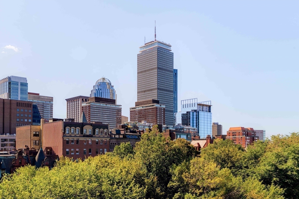 169 Commonwealth Avenue, Unit 5 Boston, MA 02116 - Photo 30 of 31 a view of a city with tall buildings