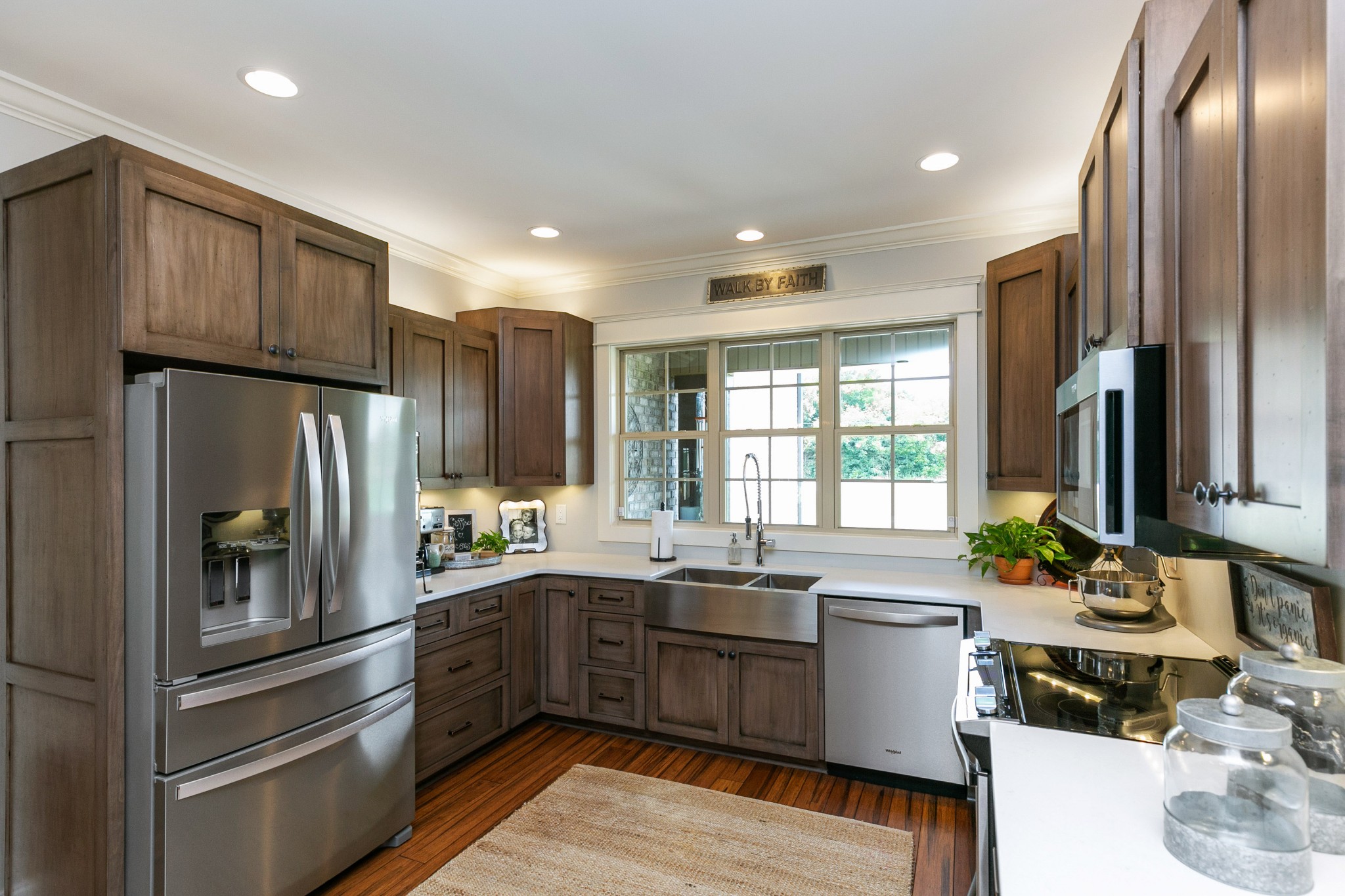 676 Burford Road Lebanon, TN 37087 - Photo 12 of 33 a kitchen with stainless steel appliances a refrigerator sink and cabinets