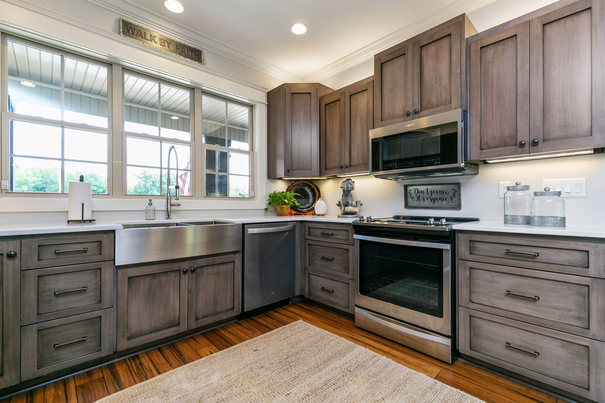676 Burford Road Lebanon, TN 37087 - Photo 13 of 33 a kitchen with stainless steel appliances granite countertop a sink a stove and cabinets