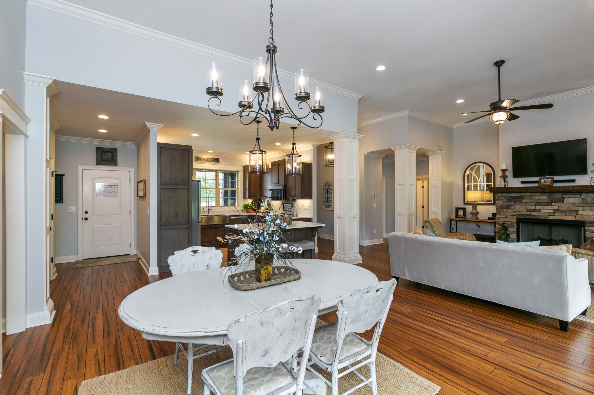 676 Burford Road Lebanon, TN 37087 - Photo 15 of 33 a view of a dining room with furniture a chandelier and wooden floor
