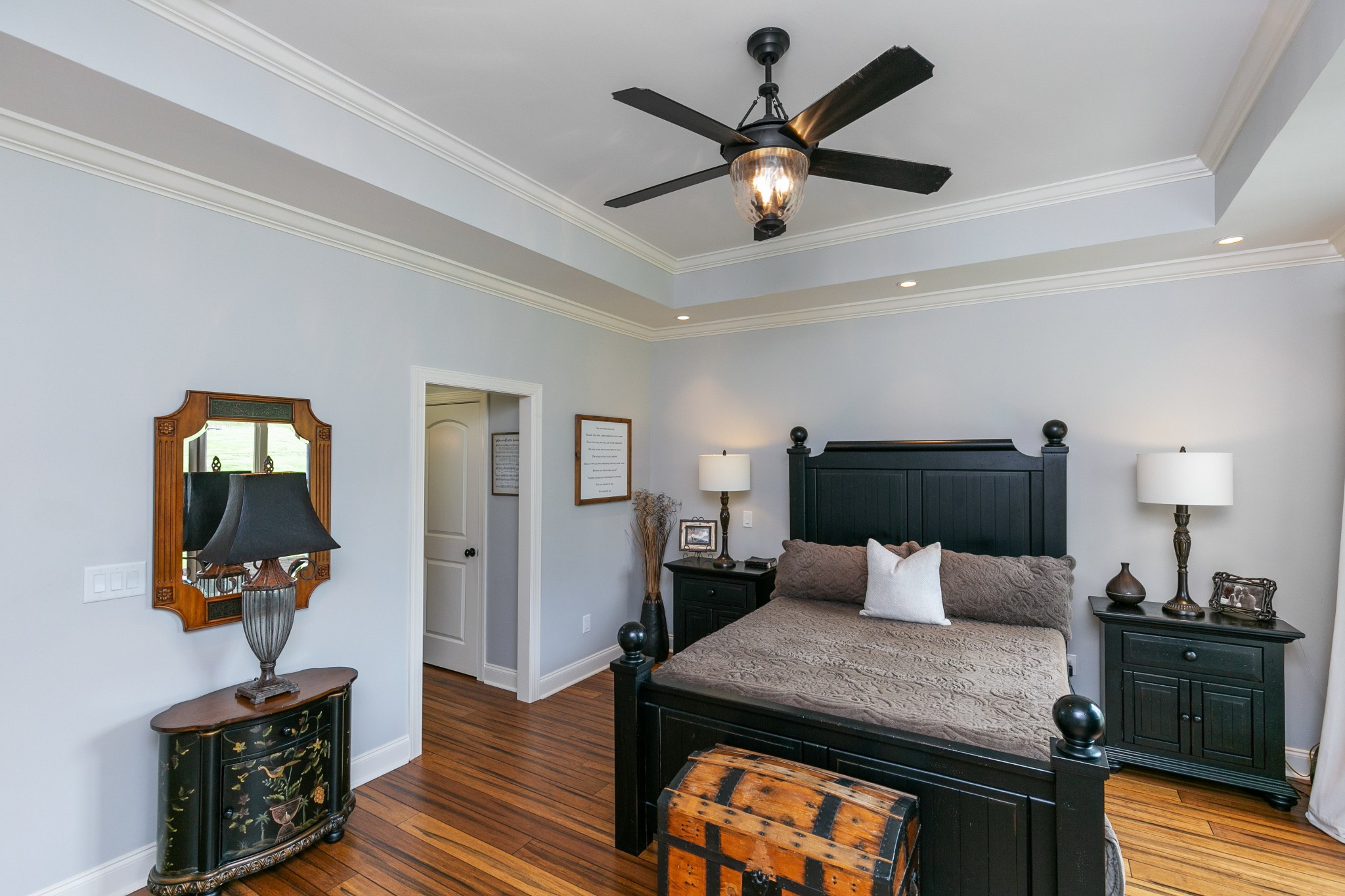 676 Burford Road Lebanon, TN 37087 - Photo 19 of 33 a bedroom with a bed and wooden floor