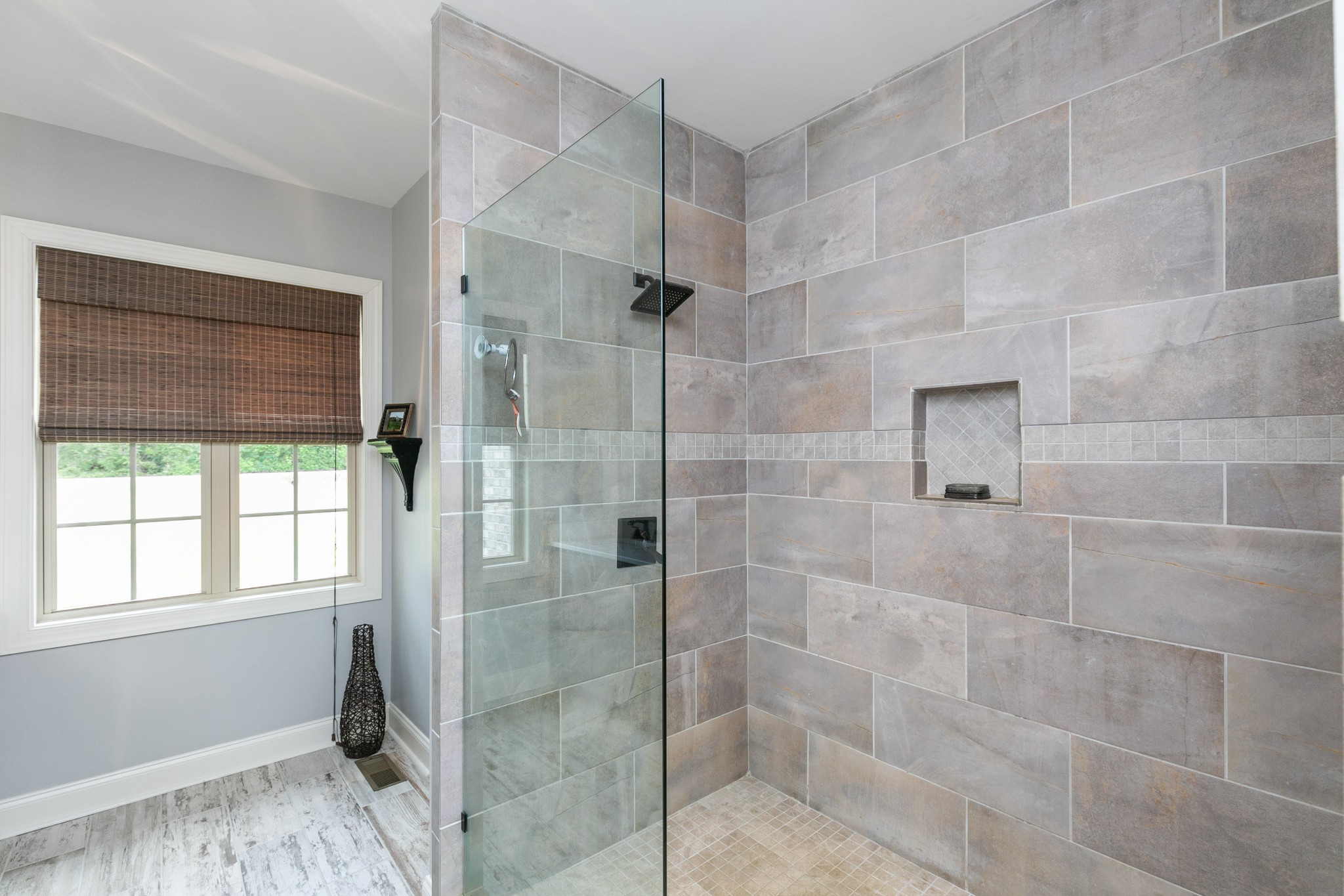 676 Burford Road Lebanon, TN 37087 - Photo 21 of 33 a bathroom with a shower and a sink