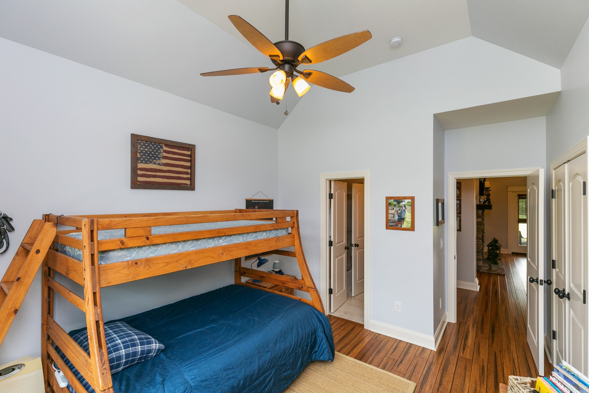 676 Burford Road Lebanon, TN 37087 - Photo 24 of 33 a living room with a bed furniture and a ceiling fan