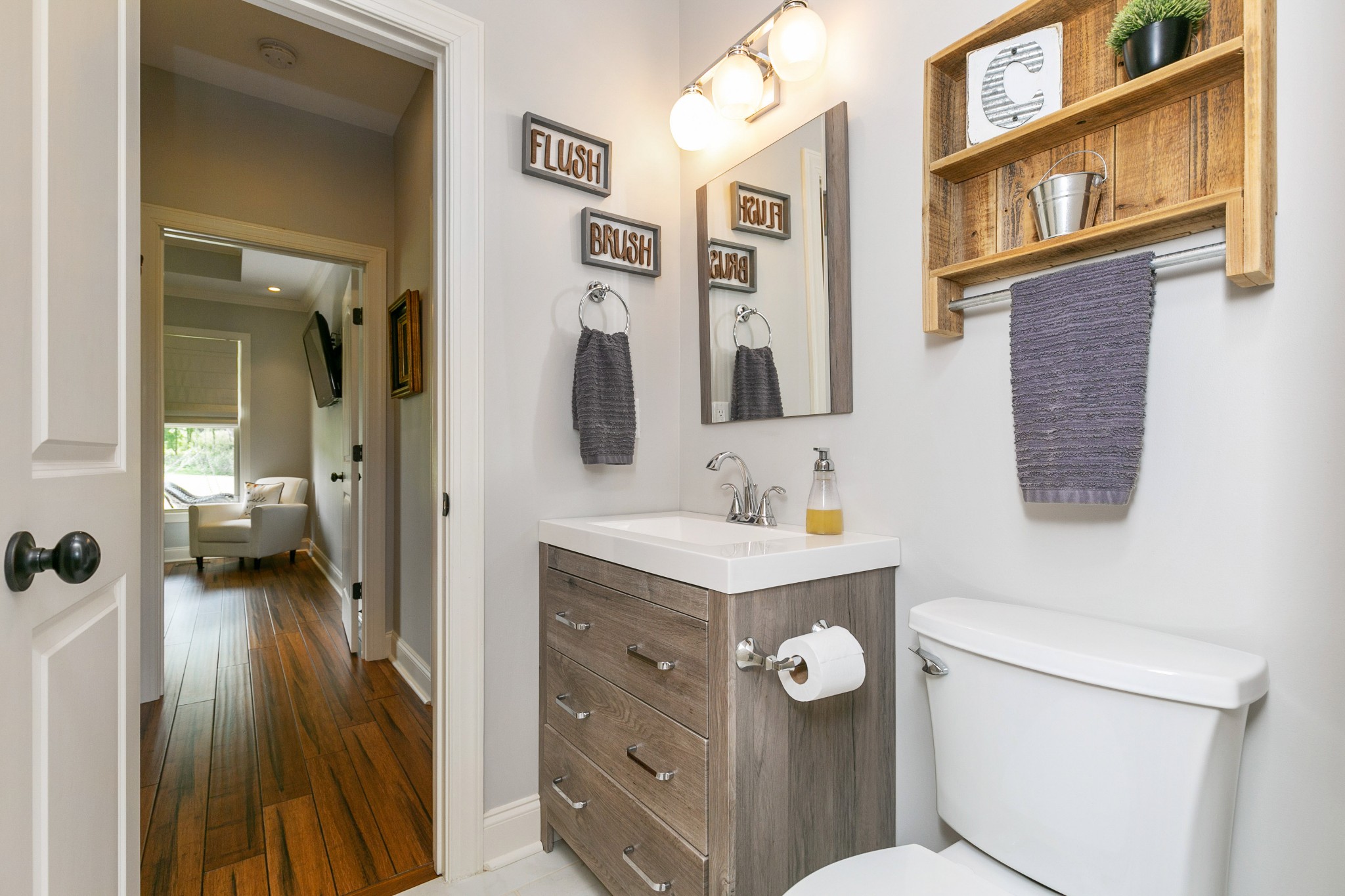 676 Burford Road Lebanon, TN 37087 - Photo 25 of 33 a bathroom with a toilet sink and mirror