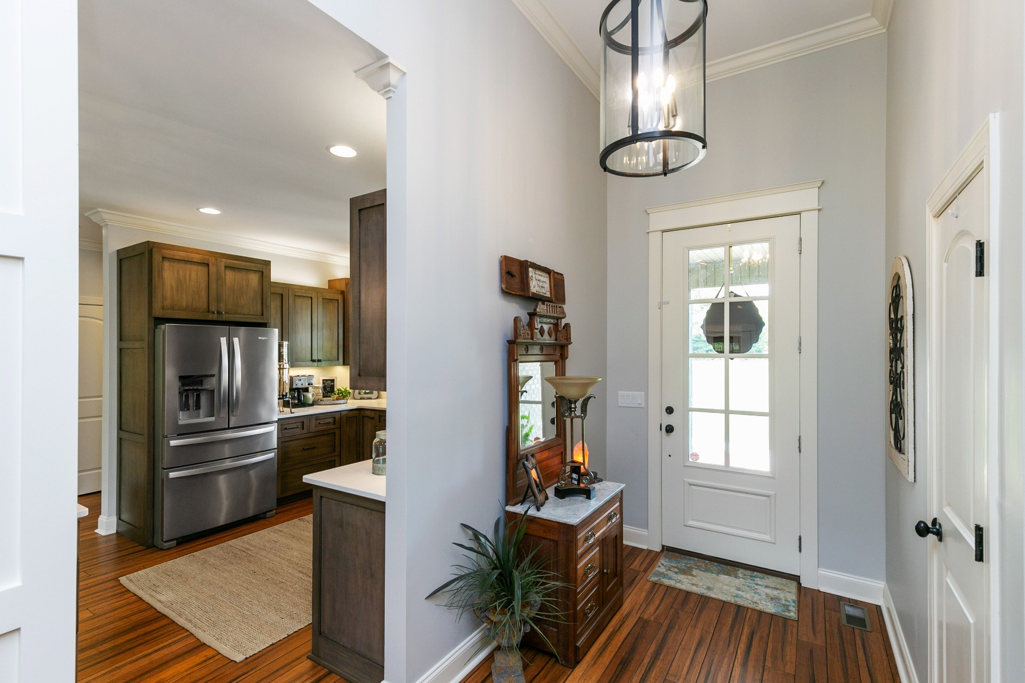 676 Burford Road Lebanon, TN 37087 - Photo 5 of 33 a kitchen with white cabinets and stainless steel appliances